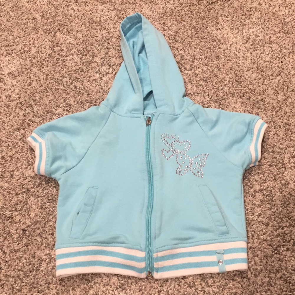 Girls light blue shirt sleeve jacket.